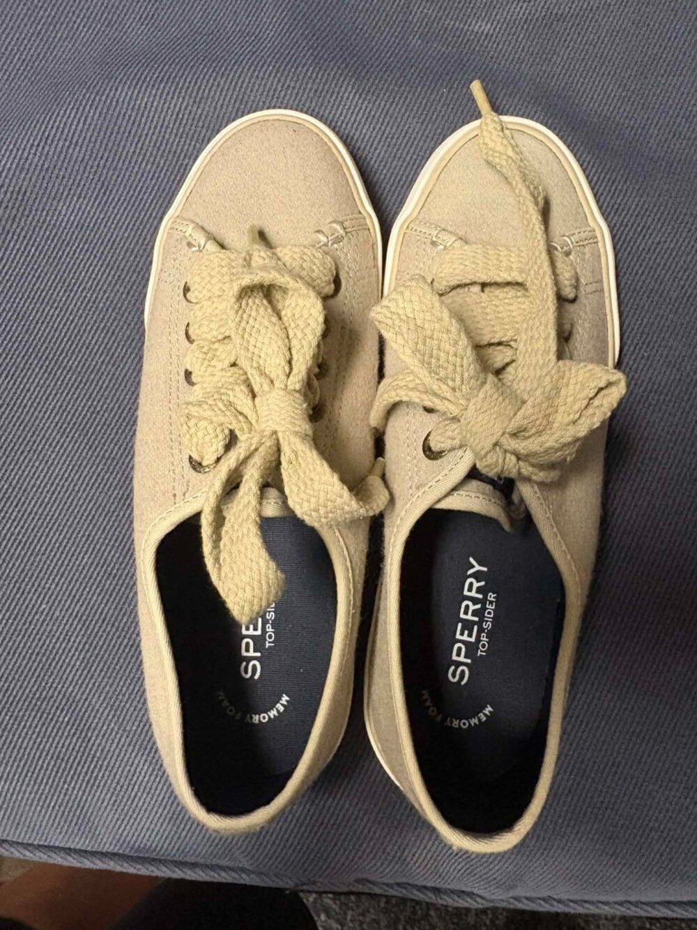 Sperry Top-Sider women's sneakers featuring a beige canvas upper and thick laces